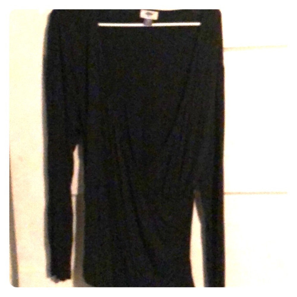 Super sexy low cut. Faux wrap top